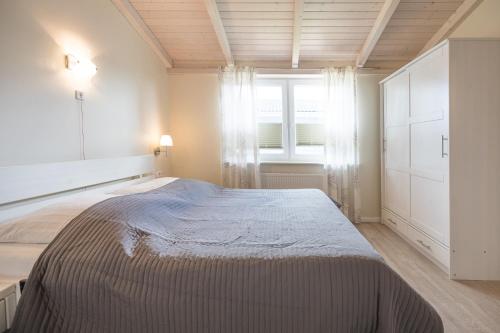 Katil atau katil-katil dalam bilik di Ferienhaus Felsenauster