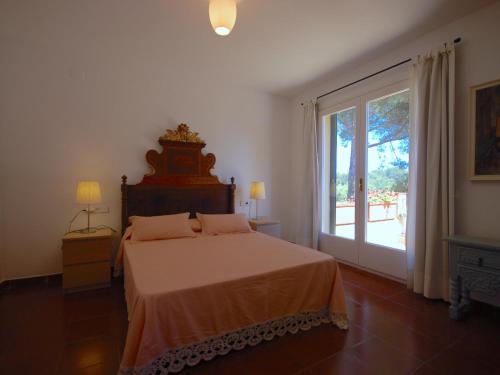 Postel nebo postele na pokoji v ubytování LETS HOLIDAYS Lovely garden house in mar menuda