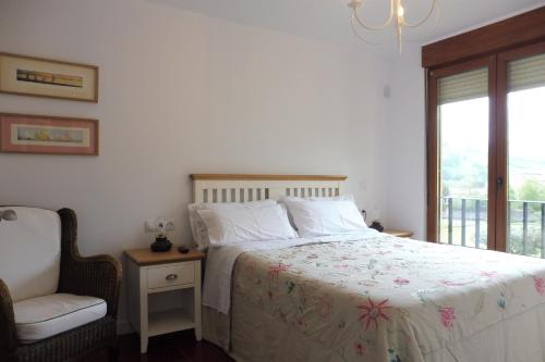 Postel nebo postele na pokoji v ubytování Casa Santolaya