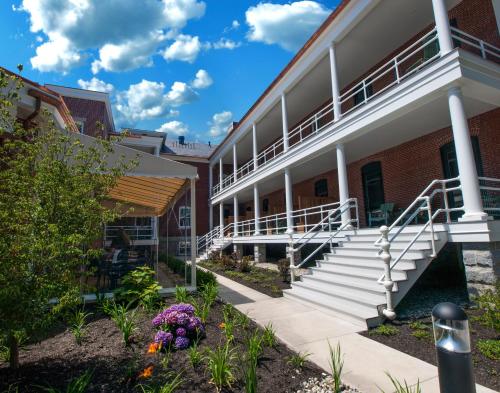 a view of the front of a building with stairs at Inn at Diamond Cove in Portland