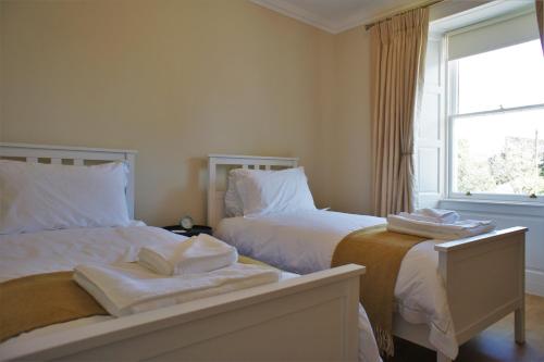 Un pat sau paturi într-o cameră la 136 West Princes Street