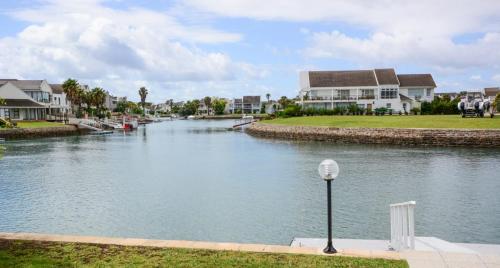 a view of a river with houses and condos at The Holy Hill Royal Alfred Marina in Port Alfred