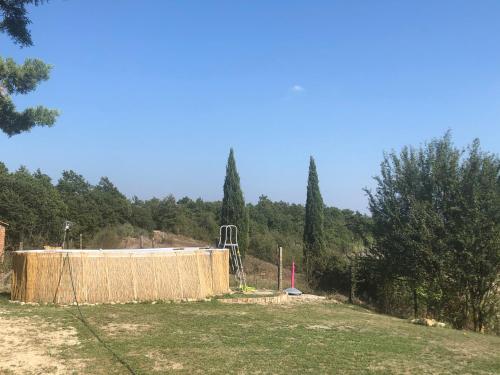 a foundation for a house with trees in the background at Casale Pian di Fratta in Fabro