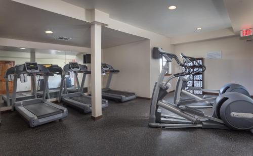 a gym with several tread machines in a room at WorldMark West Yellowstone in West Yellowstone