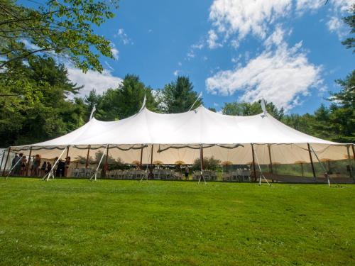 a large white tent on a grass field at Inn at Diamond Cove in Portland
