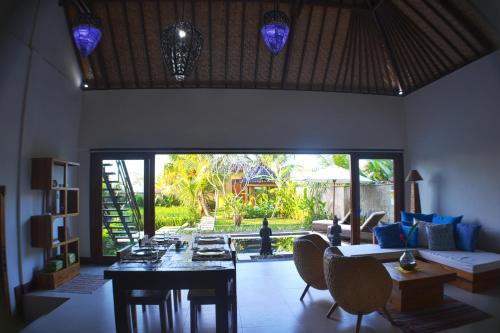 Χώρος καθιστικού στο Villa Kami Ubud