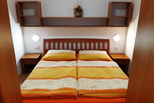 Posteľ alebo postele v izbe v ubytovaní Apartmán v centru Zlína s parkováním u domu