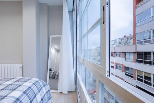 Ένα ή περισσότερα κρεβάτια σε δωμάτιο στο CASA GARO