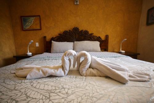 Ένα ή περισσότερα κρεβάτια σε δωμάτιο στο Hotel La Casona Real