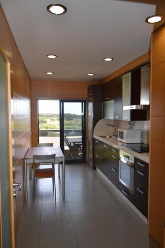 Apartamento frente ao mar com piscina de água salgada