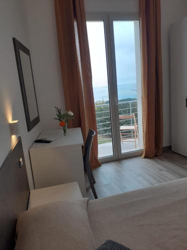 Ένα ή περισσότερα κρεβάτια σε δωμάτιο στο Bed and Breakfast Stella del Sud Makari