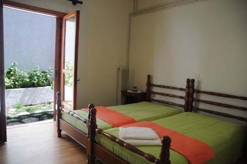 Llit o llits en una habitació de Ekavi Apartments