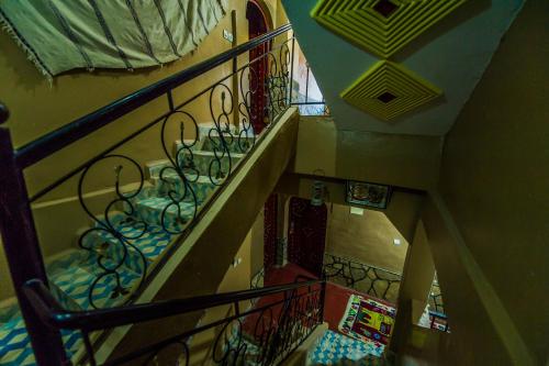 an overhead view of a spiral staircase in a building at Les Jardins De Todgha gorges de todra tinghir in Aït Baha