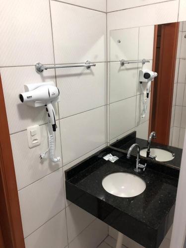 Ένα μπάνιο στο Tri Hotel Centro Chapecó