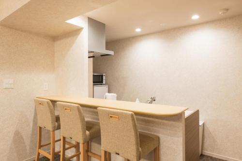 Una cocina o cocineta en HOTEL WA HAKATA