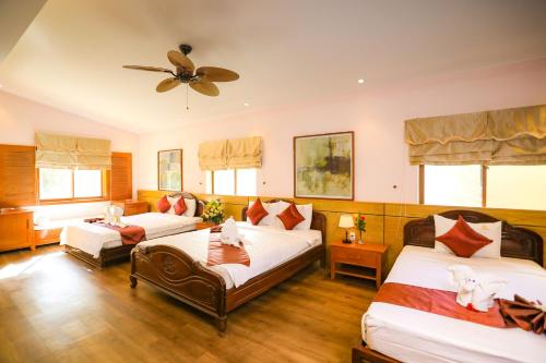 Giường trong phòng chung tại Kega Lighthouse Resort Bình Thuận