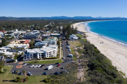 an aerial view of a resort and the beach at Bay Royal Apartments in Byron Bay