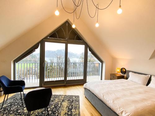 Katil atau katil-katil dalam bilik di Lakeview Villa Bled