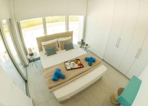 Postel nebo postele na pokoji v ubytování Imperial Jade Villas Gold Emerging Villas 3