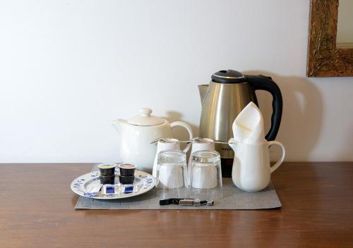 Kavos ir arbatos ruošimo rinkinys apgyvendinimo įstaigoje Farnese 48