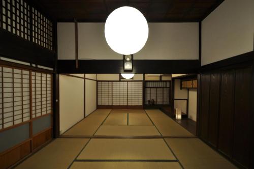 an empty room with a large white ball on the ceiling at 日向美々津の宿_Hyuga Mimitsu INN in Hyuga