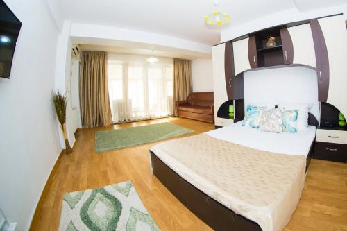 Katil atau katil-katil dalam bilik di Apartament Smarald