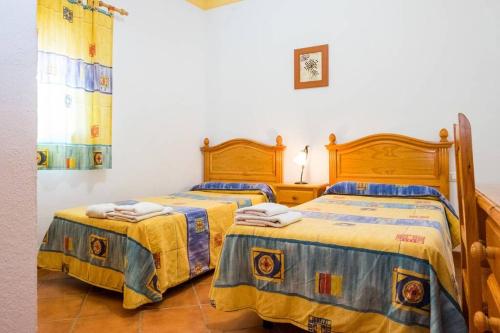 Cama o camas de una habitación en Villa el Peli