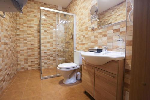 Koupelna v ubytování Hotel Jonapolis
