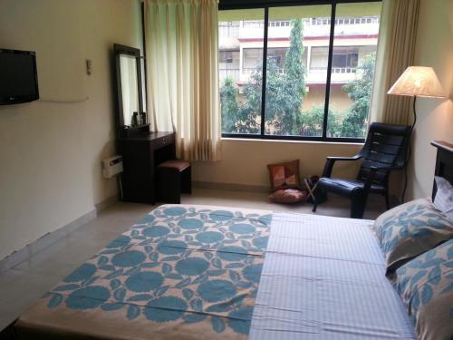 Katil atau katil-katil dalam bilik di YoYo Goa, The Apartment Hotel