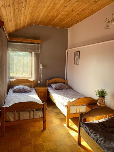 Cama o camas de una habitación en Reiumaa Motell