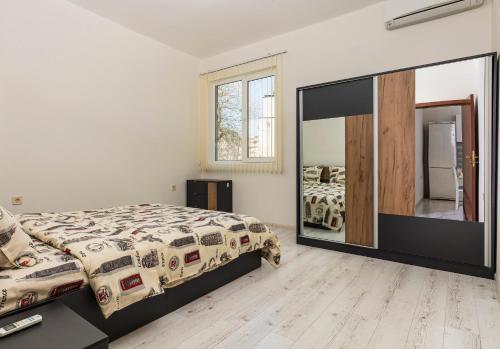A bed or beds in a room at Convenient 1BD Flat in the centre of Plovdiv