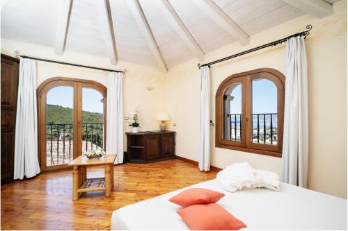 Postel nebo postele na pokoji v ubytování LH Hotel Pozzo Sacro