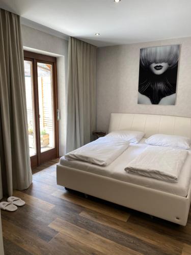 Postel nebo postele na pokoji v ubytování Ferienwohnung Zum Franziskaner