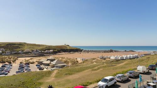 an aerial view of a parking lot next to a beach at The Edgcumbe Hotel & DECK Restaurant in Bude