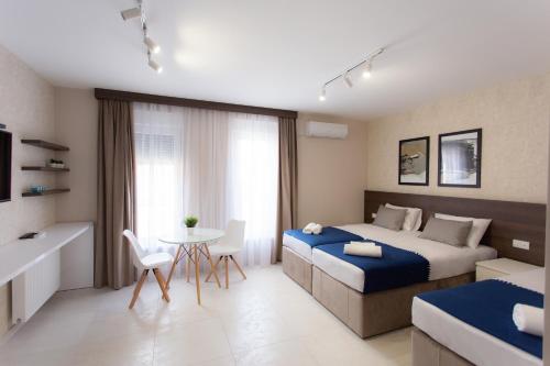 Ένα ή περισσότερα κρεβάτια σε δωμάτιο στο Villa BonnaDea