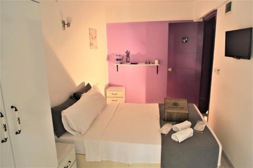 Llit o llits en una habitació de Lavender Otel