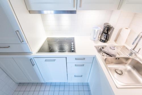 Køkken eller tekøkken på Munkmarscher Chaussee 11 Whg 22