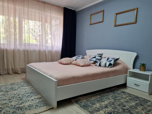 Ένα ή περισσότερα κρεβάτια σε δωμάτιο στο Casa Maria
