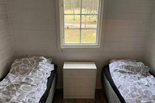 Postel nebo postele na pokoji v ubytování Ryasjö Holiday Homes