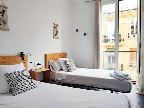 Cama o camas de una habitación en Flats Friends Torres Quart