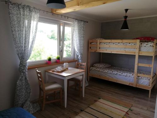 Postel nebo postele na pokoji v ubytování Pokoje goscinne u Olguni