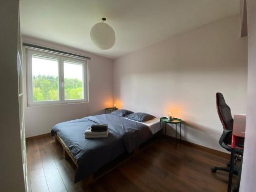 Postel nebo postele na pokoji v ubytování River Villa with amazing view + Jacuzzi, Garden, Forest access