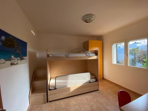 Voodi või voodid majutusasutuse Villa Fiorella Porto Cesareo LE primo piano 3 locali toas