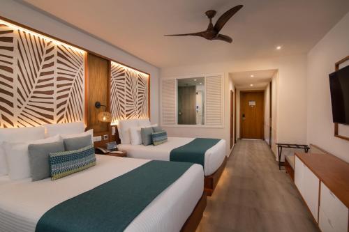Dreams Macao Beach Punta Cana - All Inclusiveにあるベッド