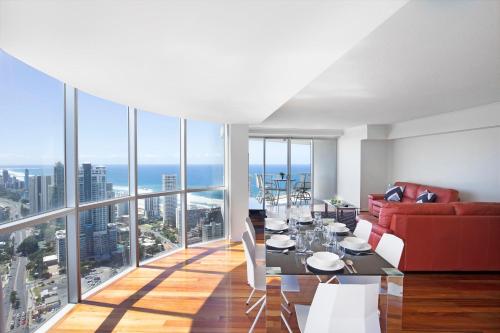 a living room with a view of the ocean at Mantra Towers of Chevron in Gold Coast