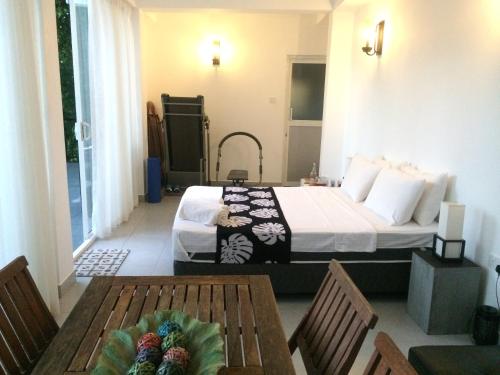 Postel nebo postele na pokoji v ubytování Selyna Sky Terrace