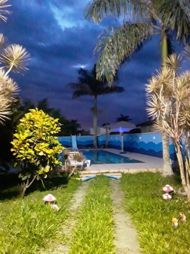 Kolam renang di atau dekat dengan Casa Unamar Verão Vermelho Cabo Frio