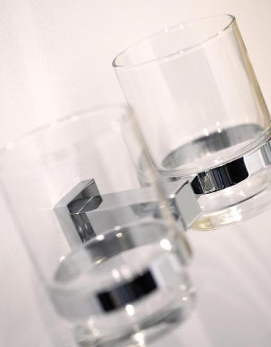a close up of a wine glass next to at Amaris Hotel Pettarani - Makassar in Makassar