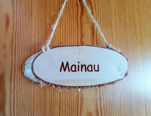 a sign that says mamau hanging on a wall at BodenSEE Privatzimmer "Haus am Weinberg Konstanz" in Konstanz