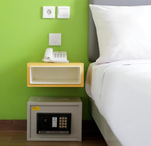 Postel nebo postele na pokoji v ubytování Amaris Hotel Thamrin City